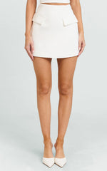 Karlene Mini Skirt - Tulip Shape Pocket Flap Skirt in White